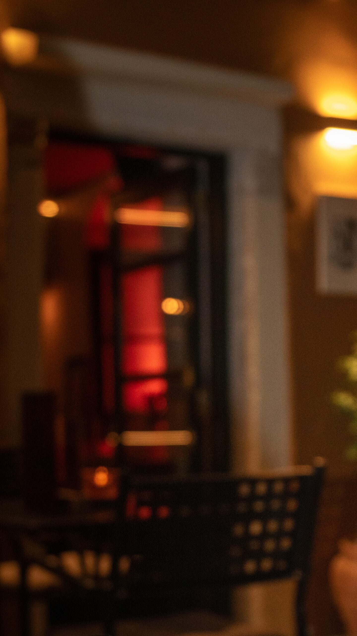 Bartender serving cocktails at 7 Sins Cocktail House Corfu